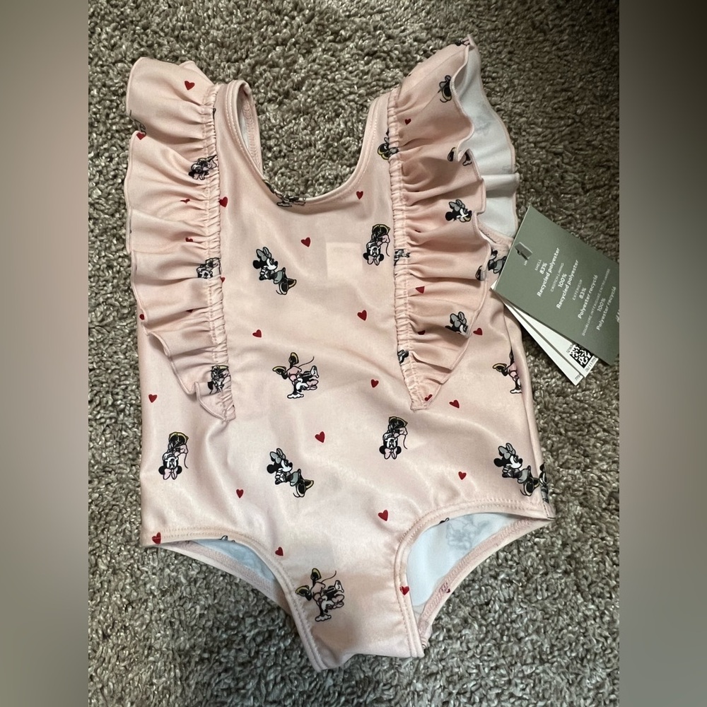 Brand new with tags at Disney swimwear 3 to 6 months
